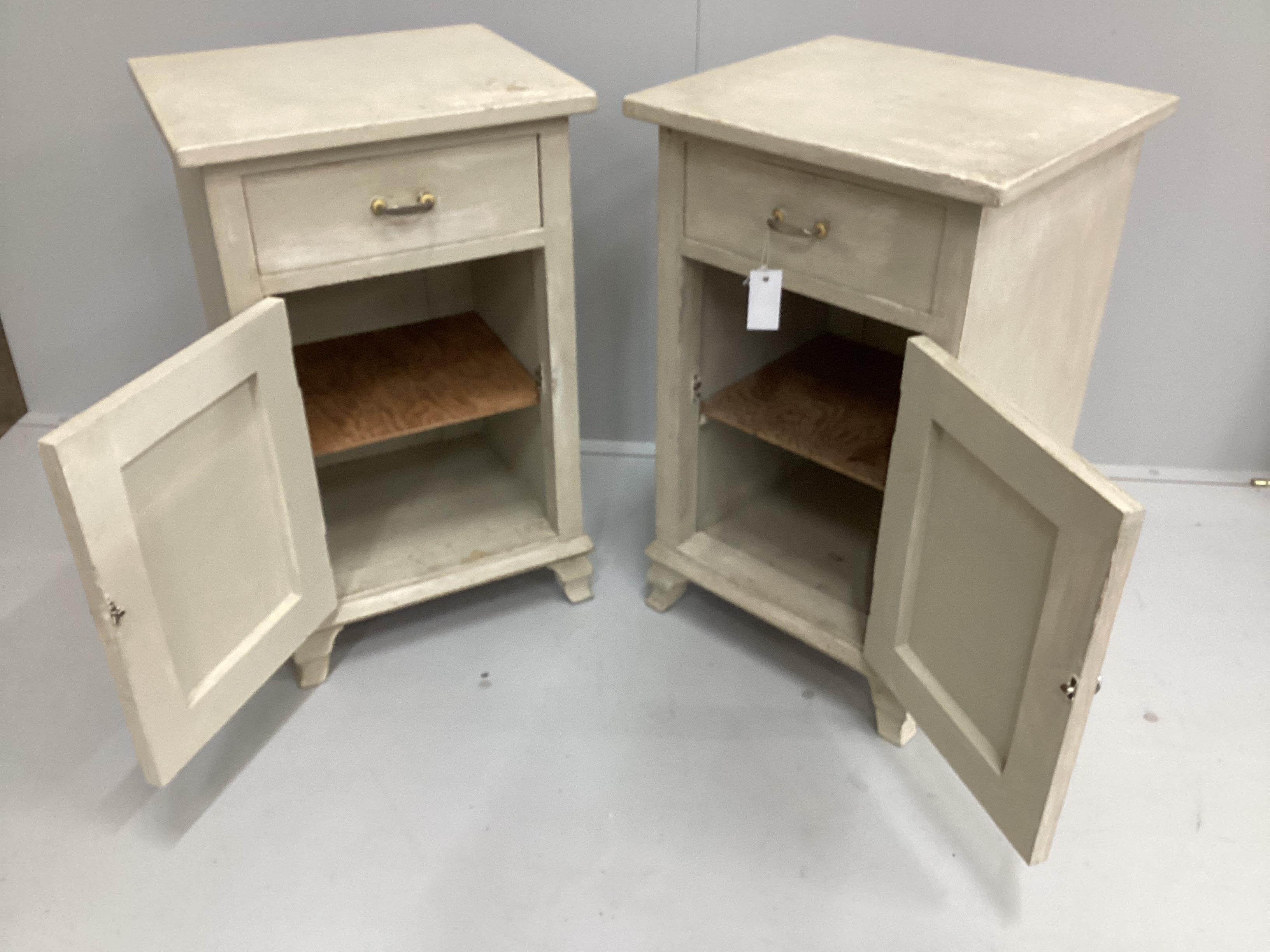 A pair of painted pine bedside cabinets, width 46cm, depth 40cm, height 72cm